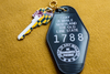 Stay Awhile - Motel Keychain